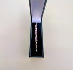 Sterling Silver Purple Gemstone Bangle with Figure-of-Eight Design. NEW IN STOCK.