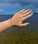 Sterling Silver Purple Gemstone Bangle with Figure-of-Eight Design. NEW IN STOCK.