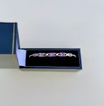Sterling Silver Purple Gemstone Bangle with Figure-of-Eight Design. NEW IN STOCK.